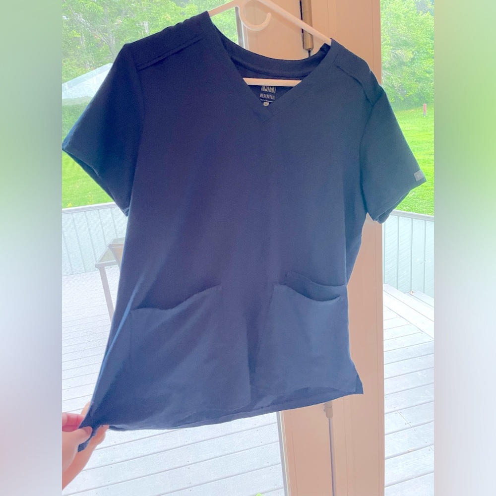Navy blue med couture scrubs, no tags but never worn!
